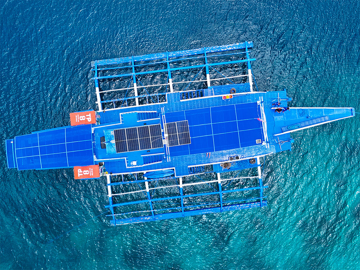 Expedition boat with solar-powered charging station for your devices